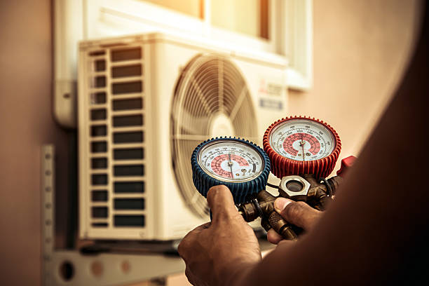 Professional Emergency Hvac technician working in Fredericksburg, VA